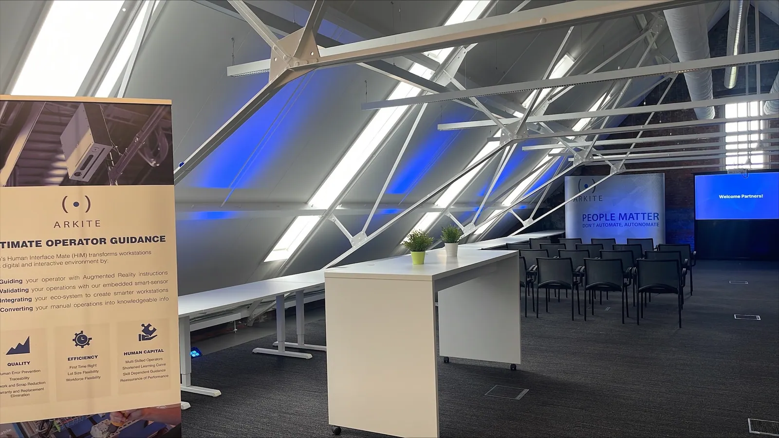 Espacio de eventos de partners de Arkite en Genk, preparado para una sesión con partners